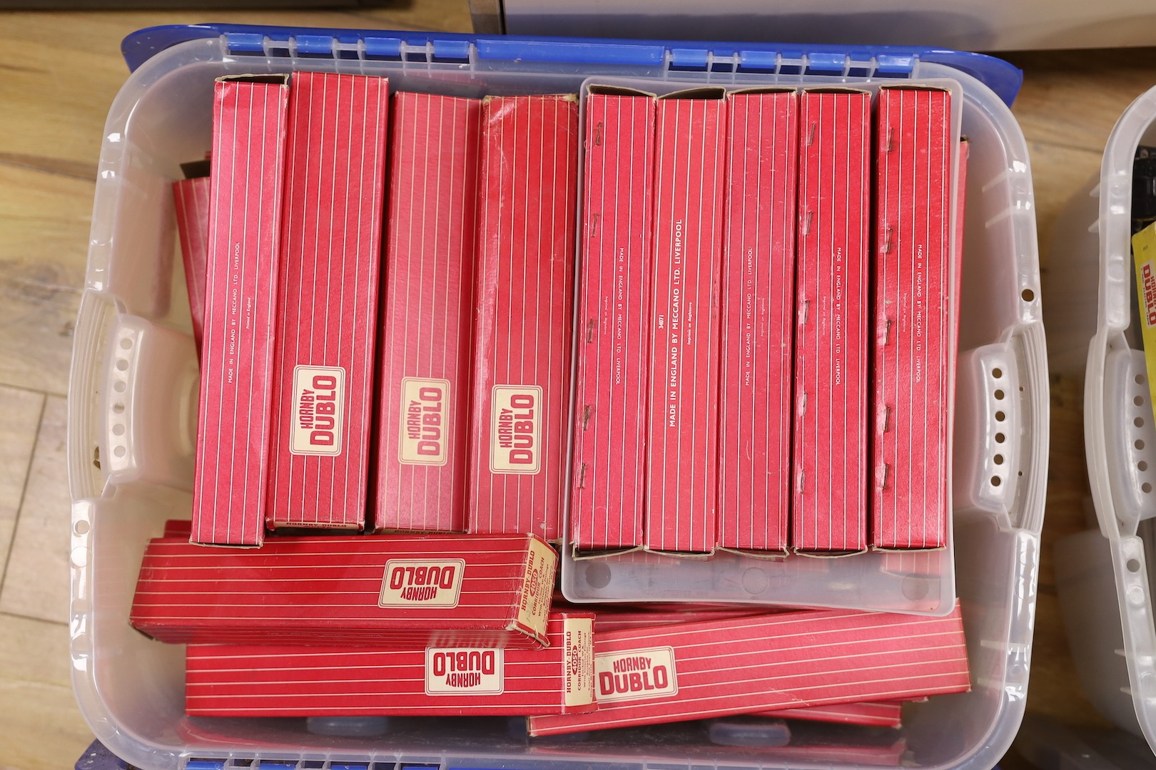 A large quantity of Hornby Dublo carriages, wagons and other rolling stock, much with original boxes, much unboxed, spare boxes which may well match, 5 boxes